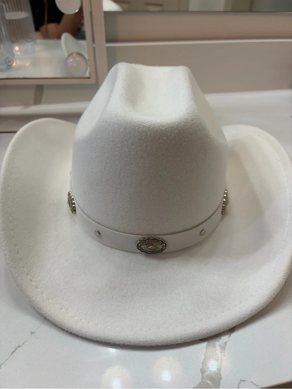 White Cowboy Hat with Decorative Conchos